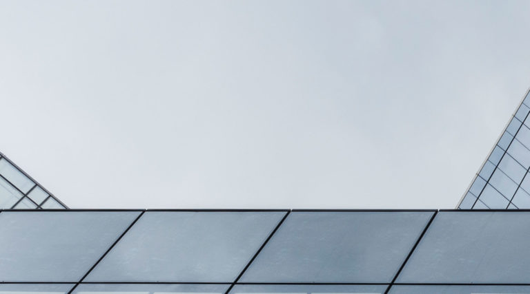 Grey tiles from the exterior of a building