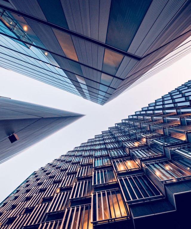 Worm's eye view of three skyscrapers