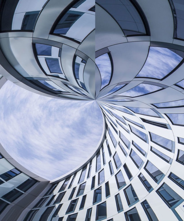 Worm's-eye view of a building with many windows