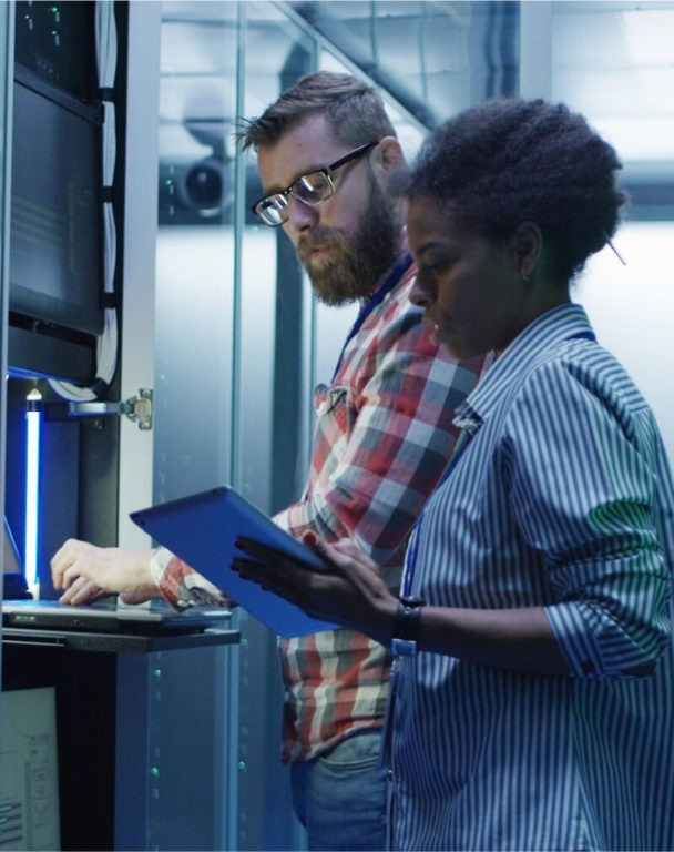 IT coworkers working in a data center