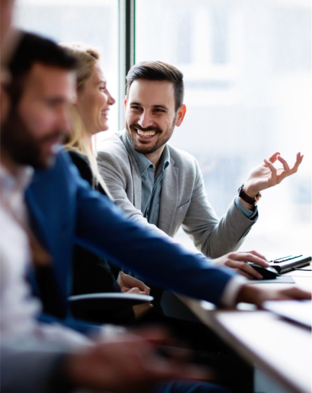 Young business people working on computer in office