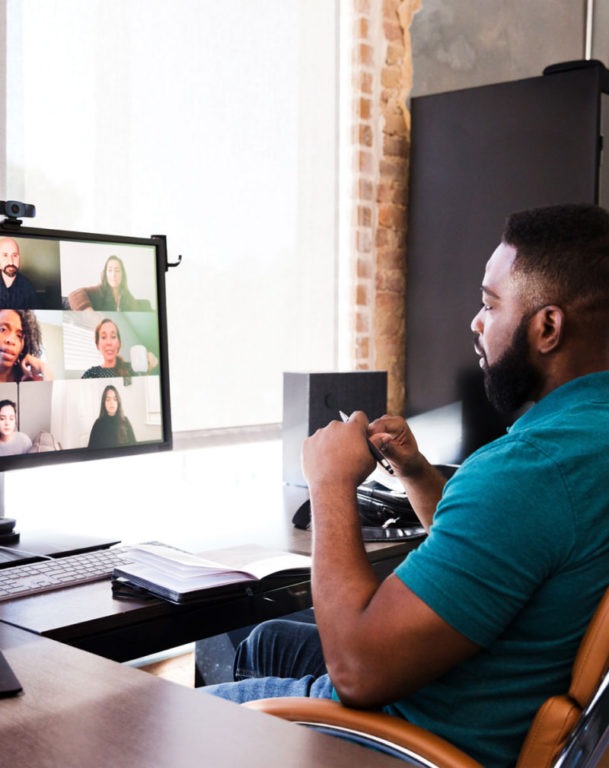 Man on virtual team meeting call
