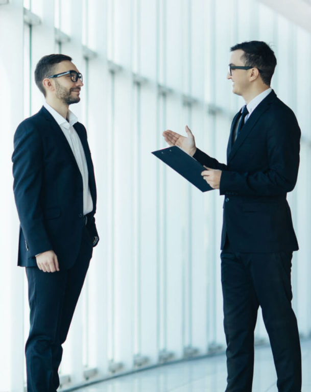 Two businessmen having a conversation