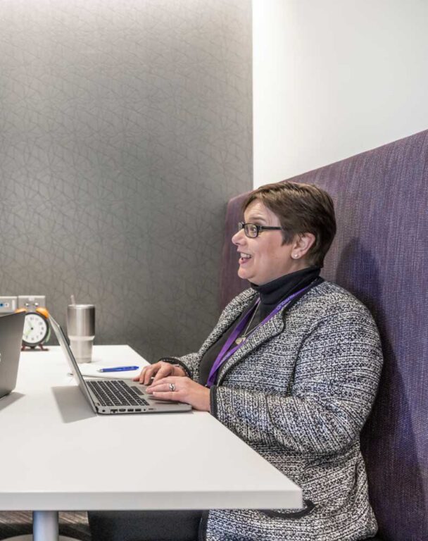 Employee on video call in an office
