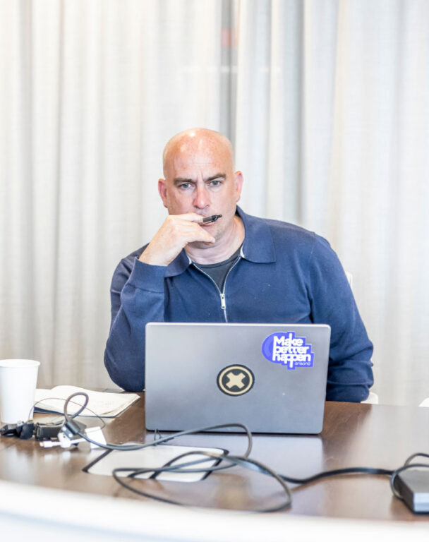 Employee focused looking at laptop