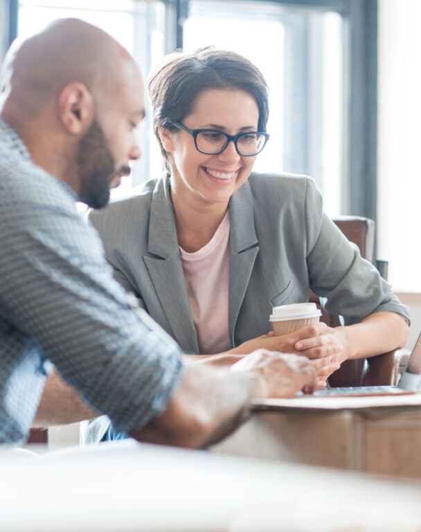 Two people working at a desk