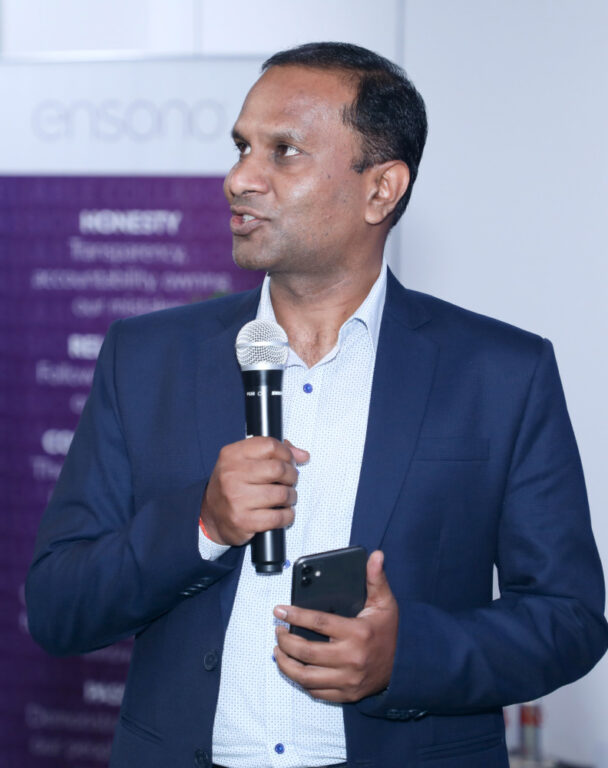 Ensono employee speaking at a conference