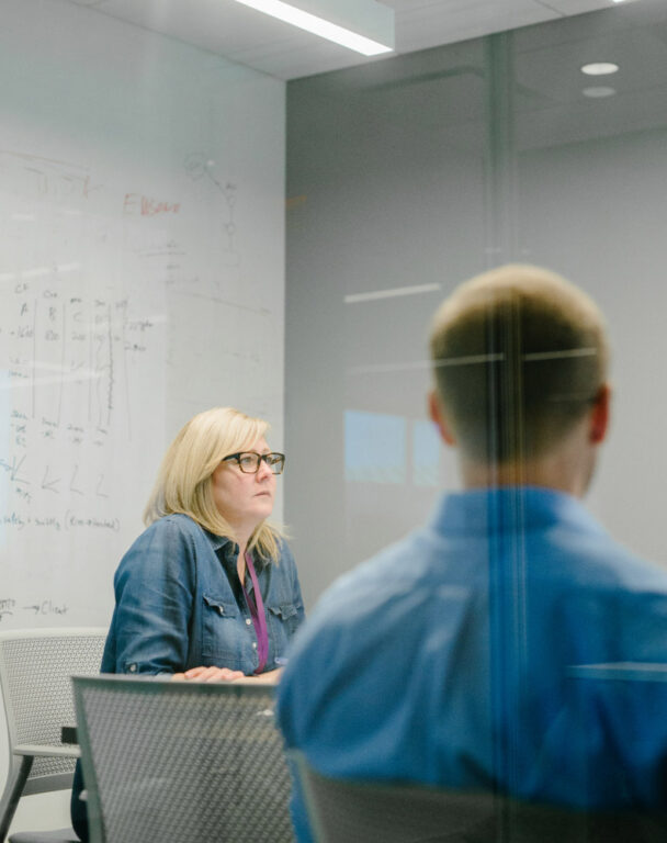 Employee in meeting room